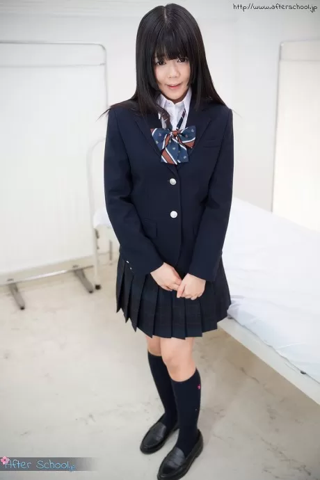 Horny Asian schoolgirl gets rid of her skirt and flaunts her ass and pussy